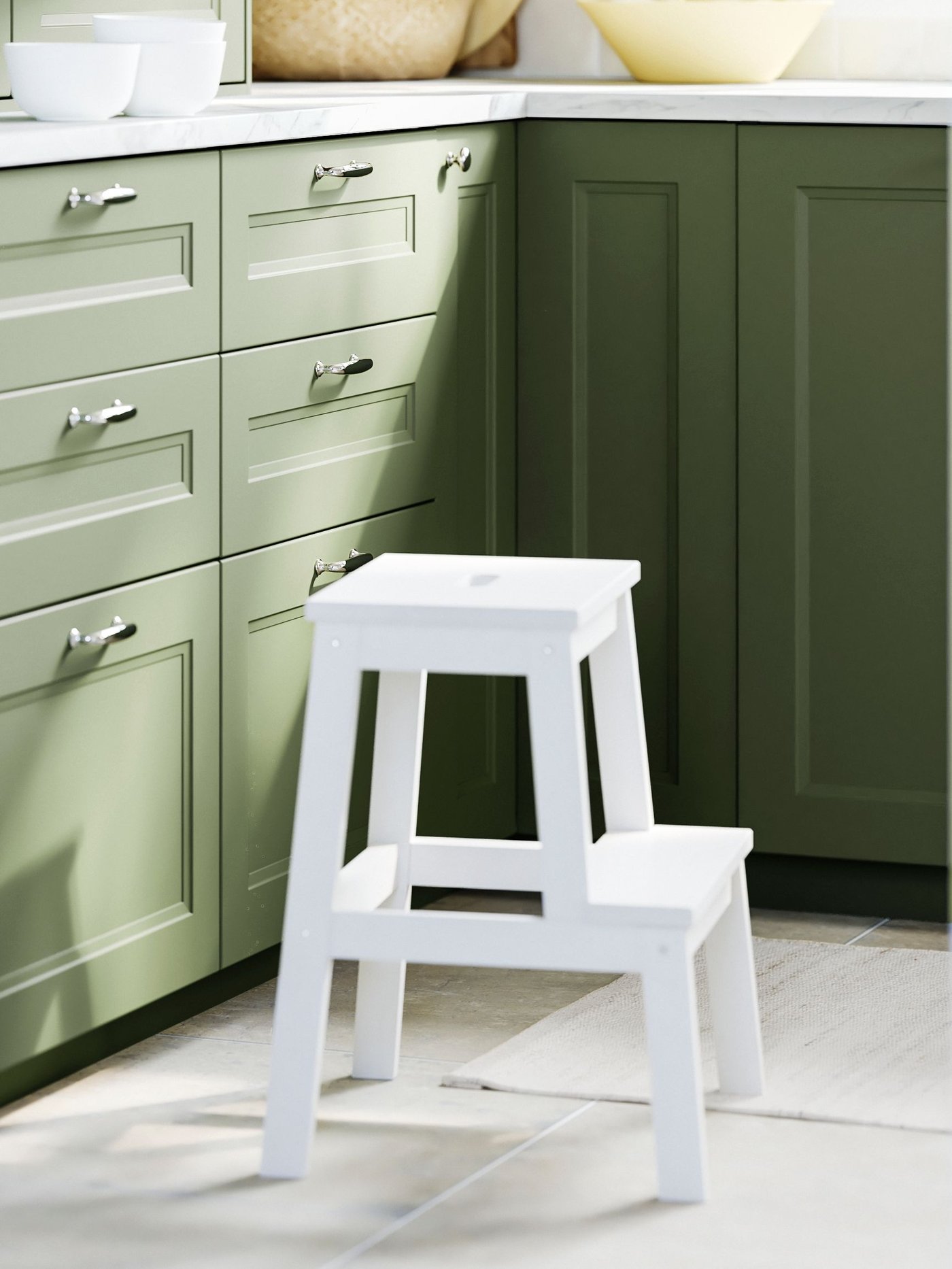An Axstad grey-green METOD 1 front for dishwasher in the kitchen
