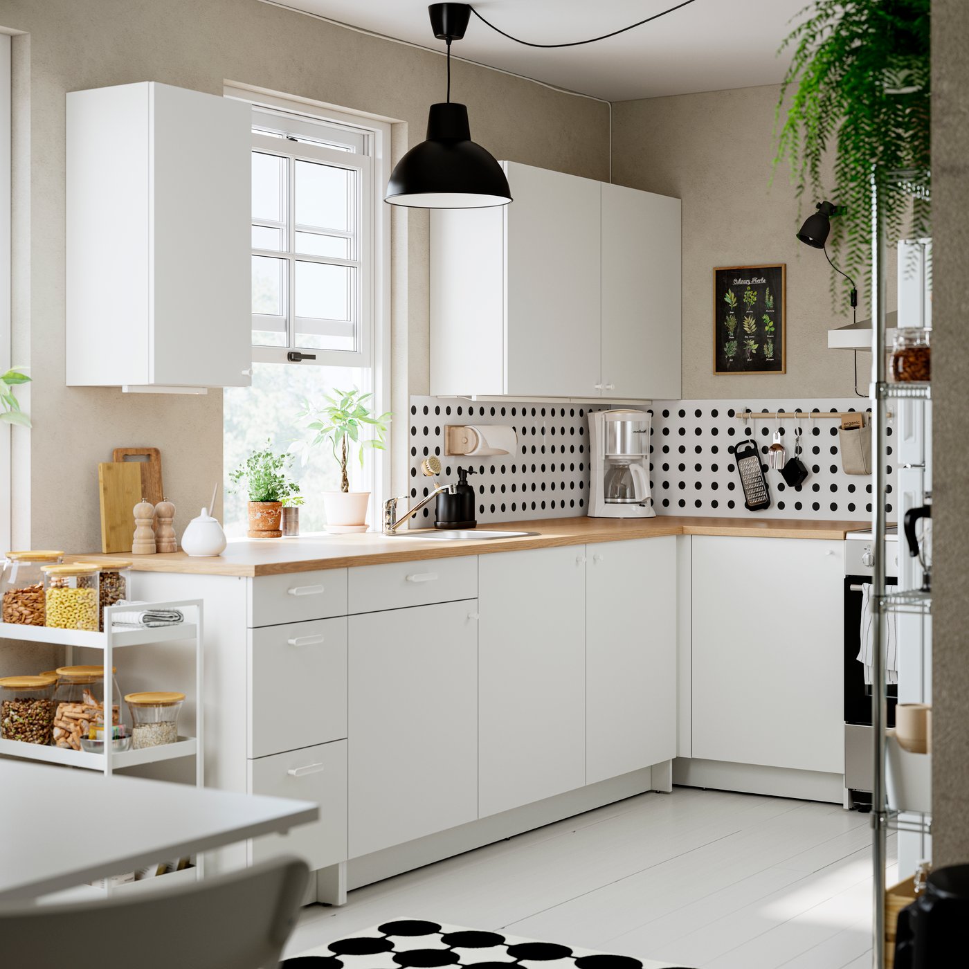 A white KNOXHULT corner kitchen