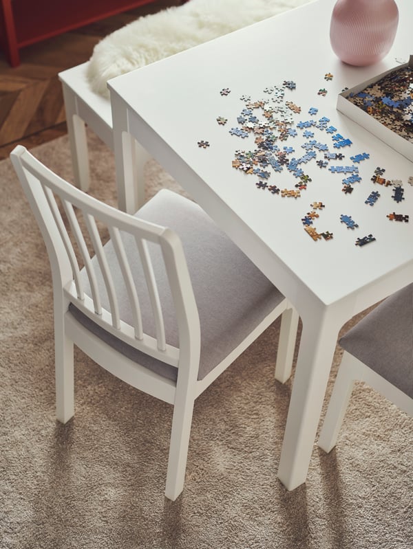 An off-white STOENSE rug, low pile