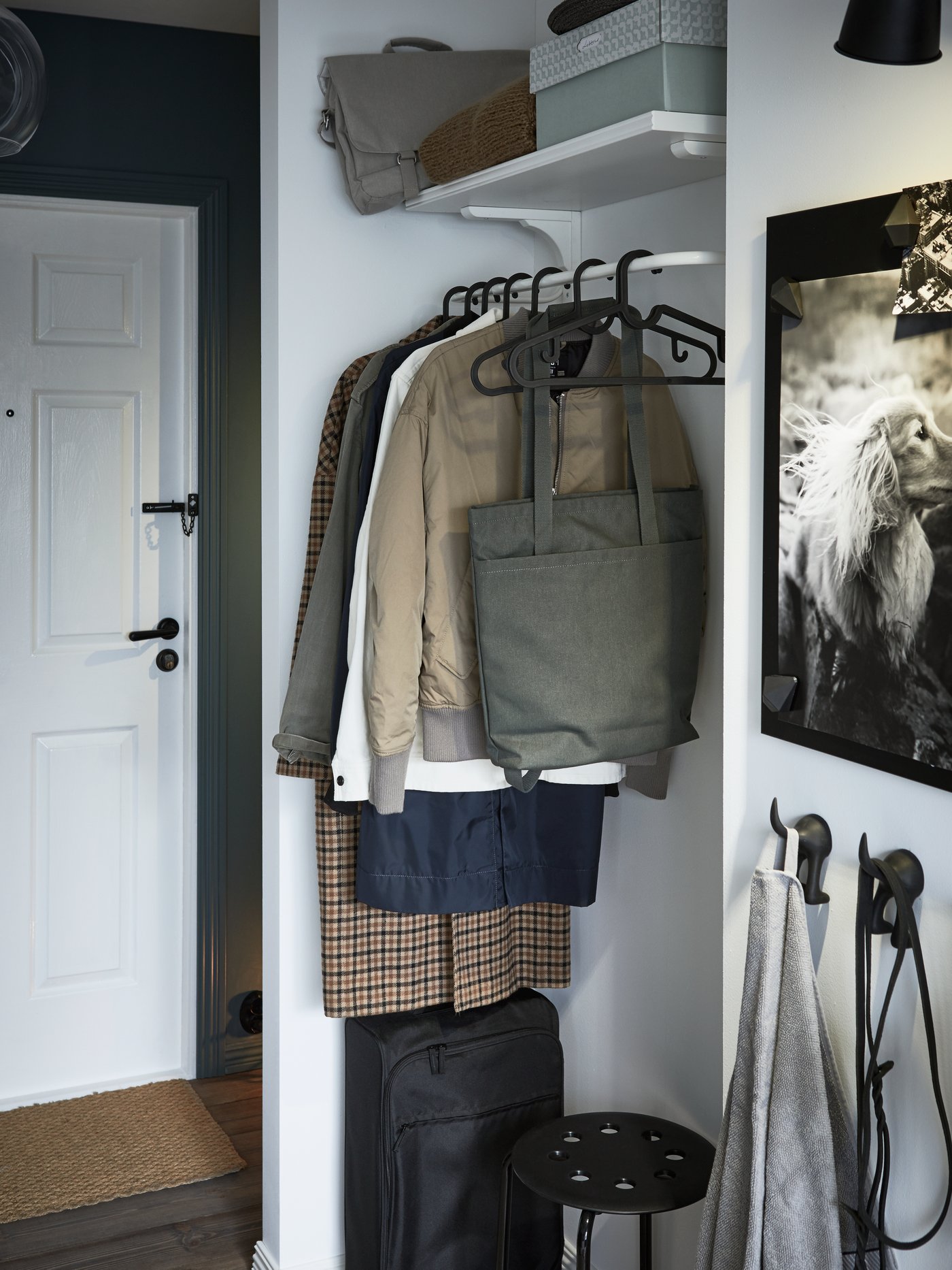 A black SVENSÅS memo board in the hallway