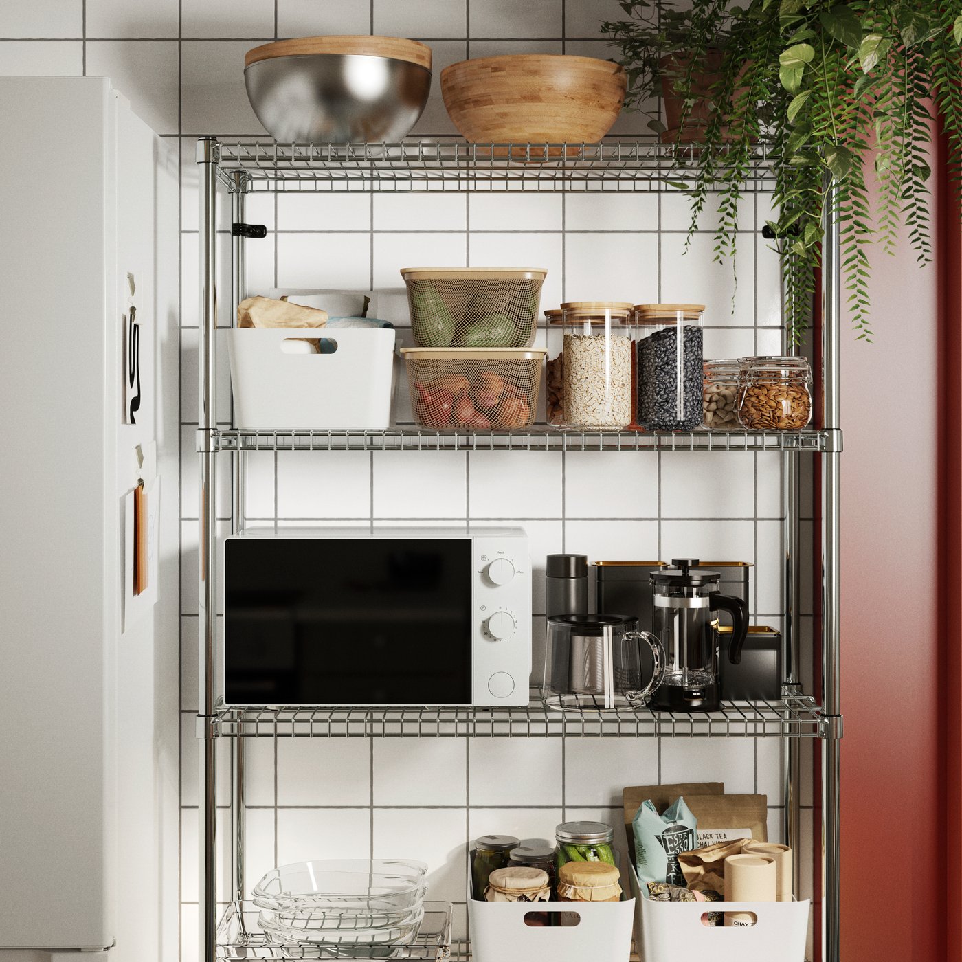 An OMAR shelving unit features a metallic frame with food jars, a microwave, and boxes neatly arranged on its shelves.