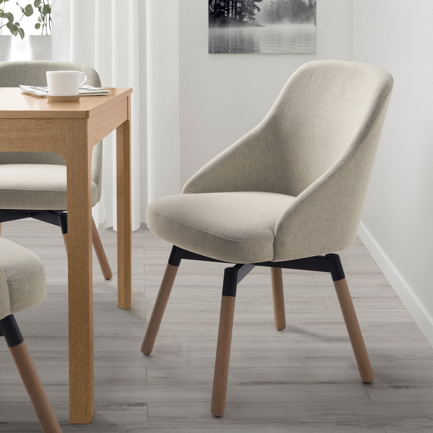 A Gunnared beige JANOLOF swivel dining chair