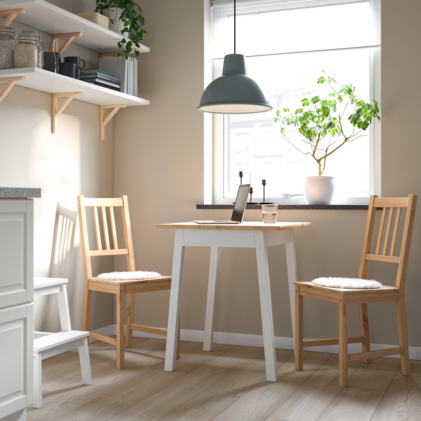 A light brown stained white stained/light brown stained PINNTORP table and 2 chairs