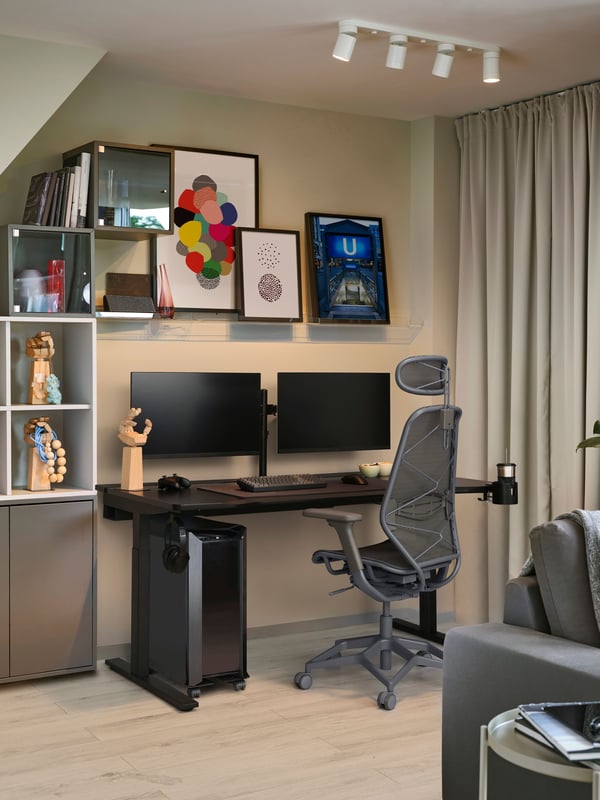 A dark grey/grey STYRSPEL gaming chair