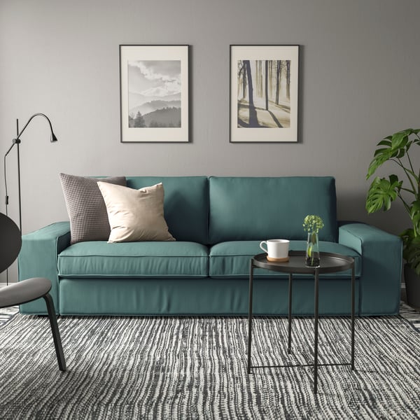 A Kelinge grey-turquoise KIVIK 3-seat sofa in the living room