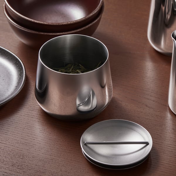 steel cup on table