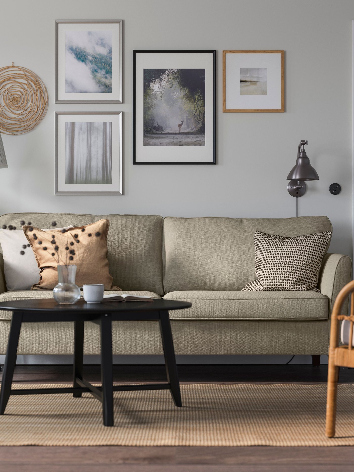 A Hakebo beige EKHOLMA 3-seat sofa in the living room