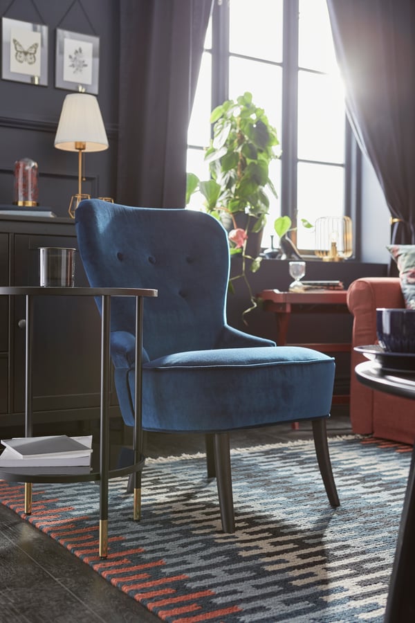 A handmade multicolour RESENSTAD rug, flatwoven in the living room
