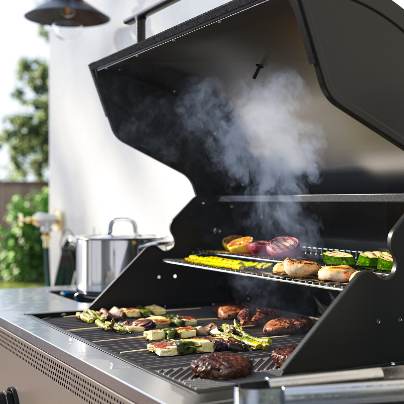 IKEA BÅTSKÄR dark-grey outdoor gas barbecue with side burner.