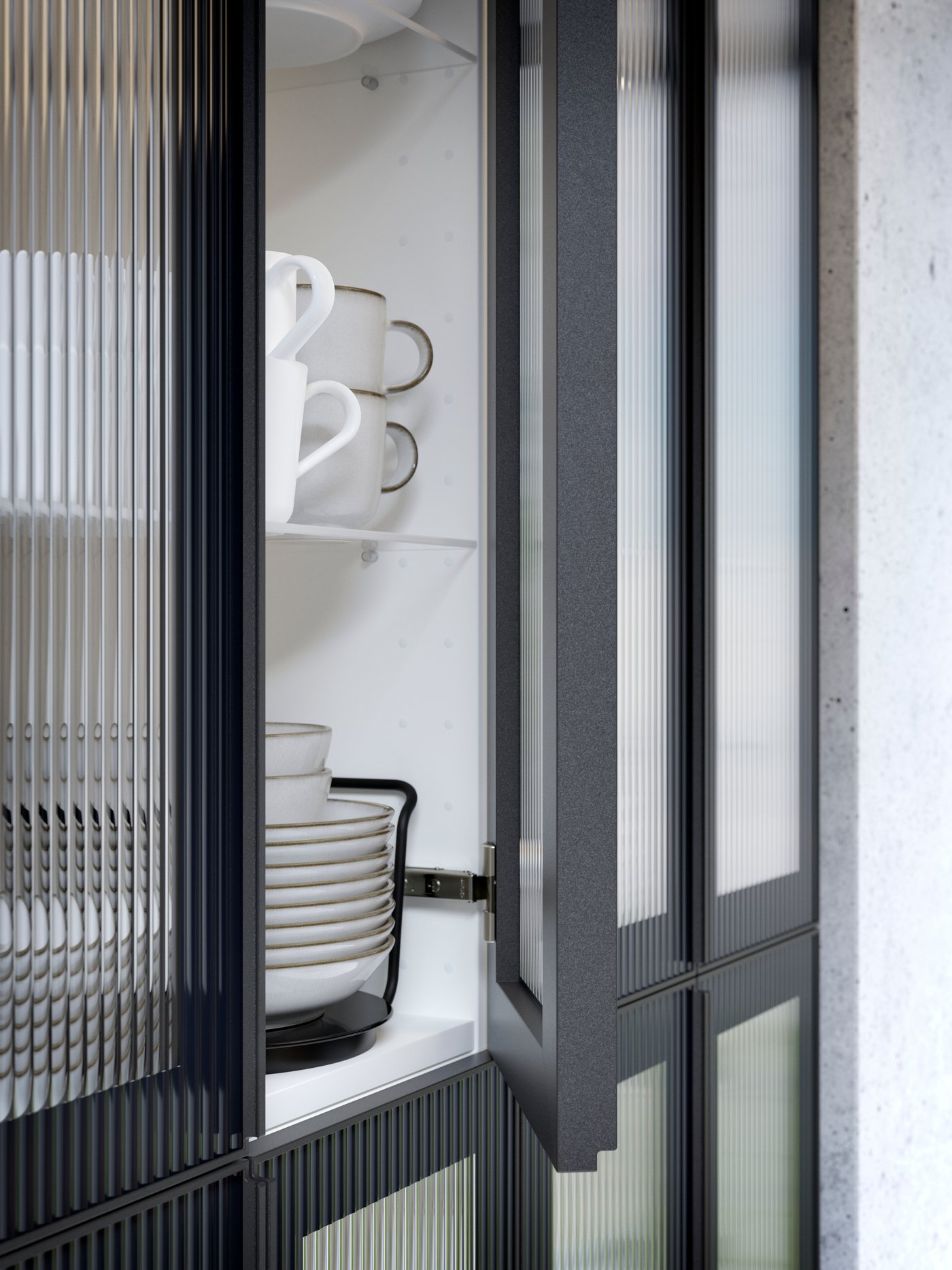 A kitchen cabinet with a HEJSTA door open