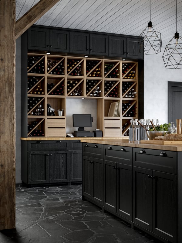 kitchen space with a wall dedicated to wine storage solutions