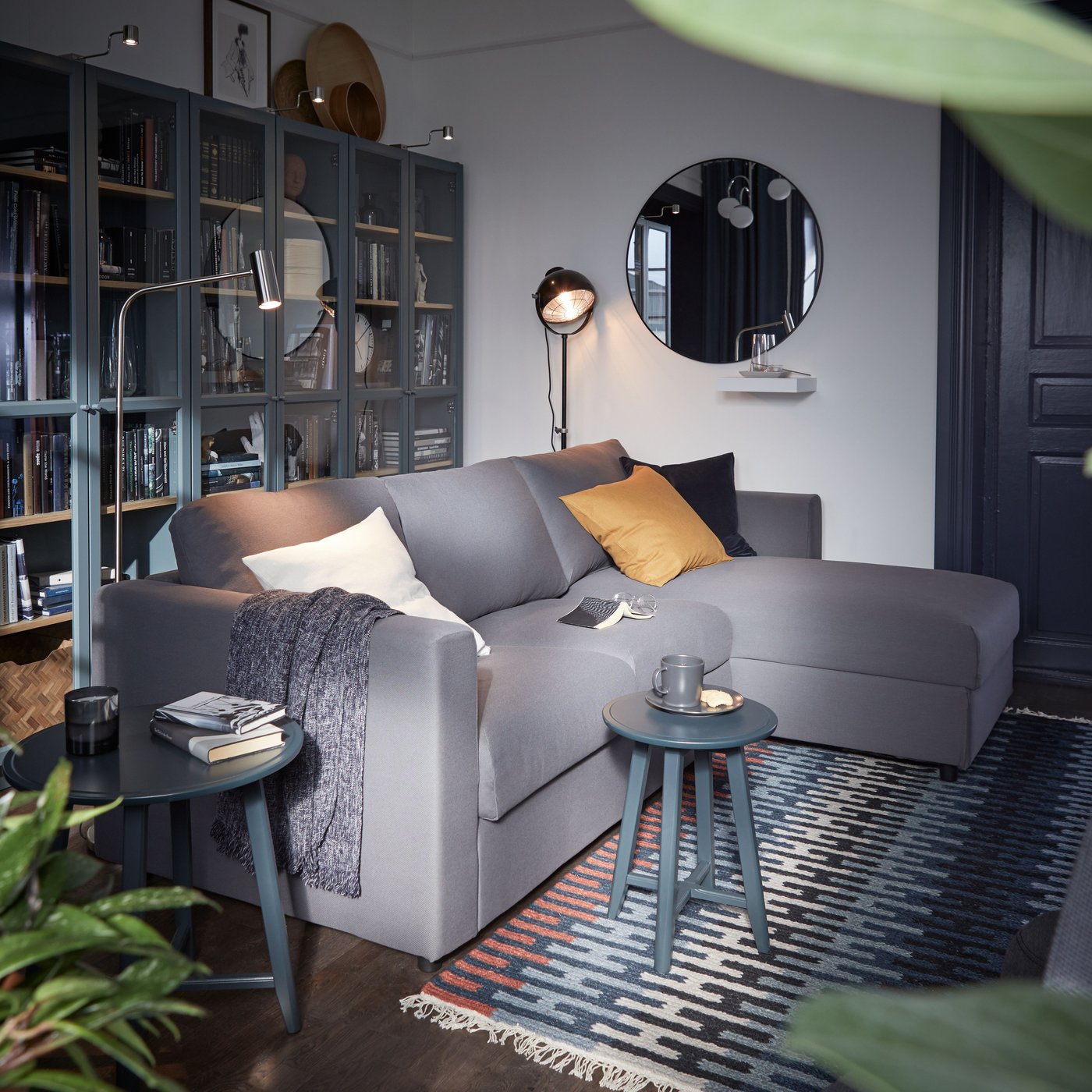 A black SVARTNORA floor lamp in the living room