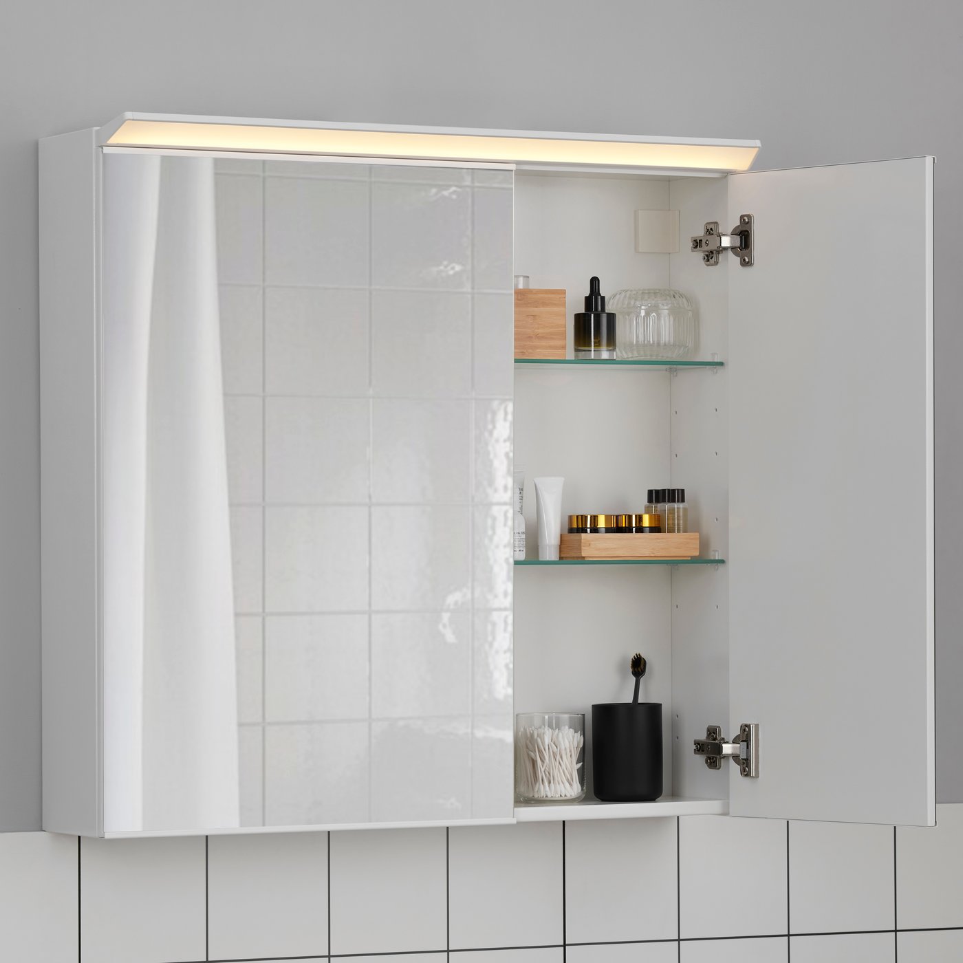 A TREASJÖN mirror cab 2 door/built-in lighting in the bathroom