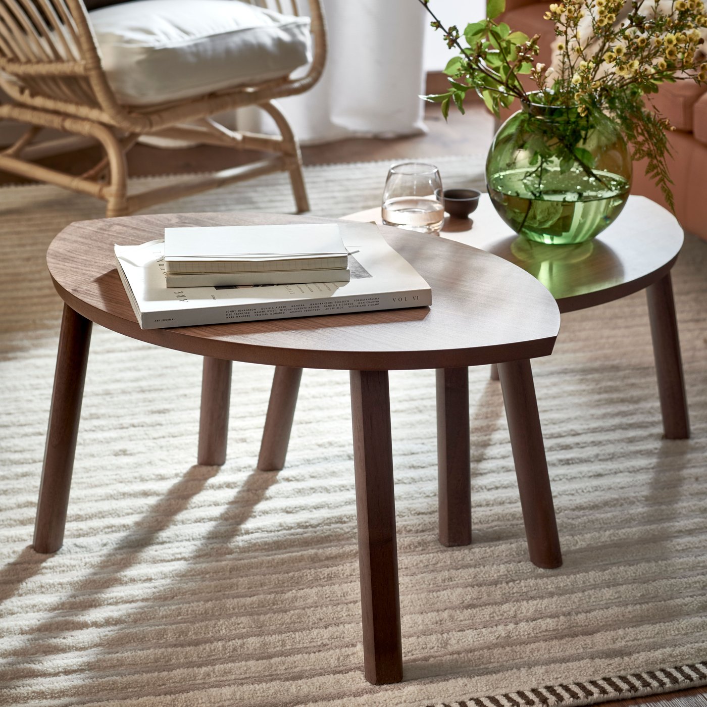 A white/beige TÅGSPÅR rug, high pile in the living room.