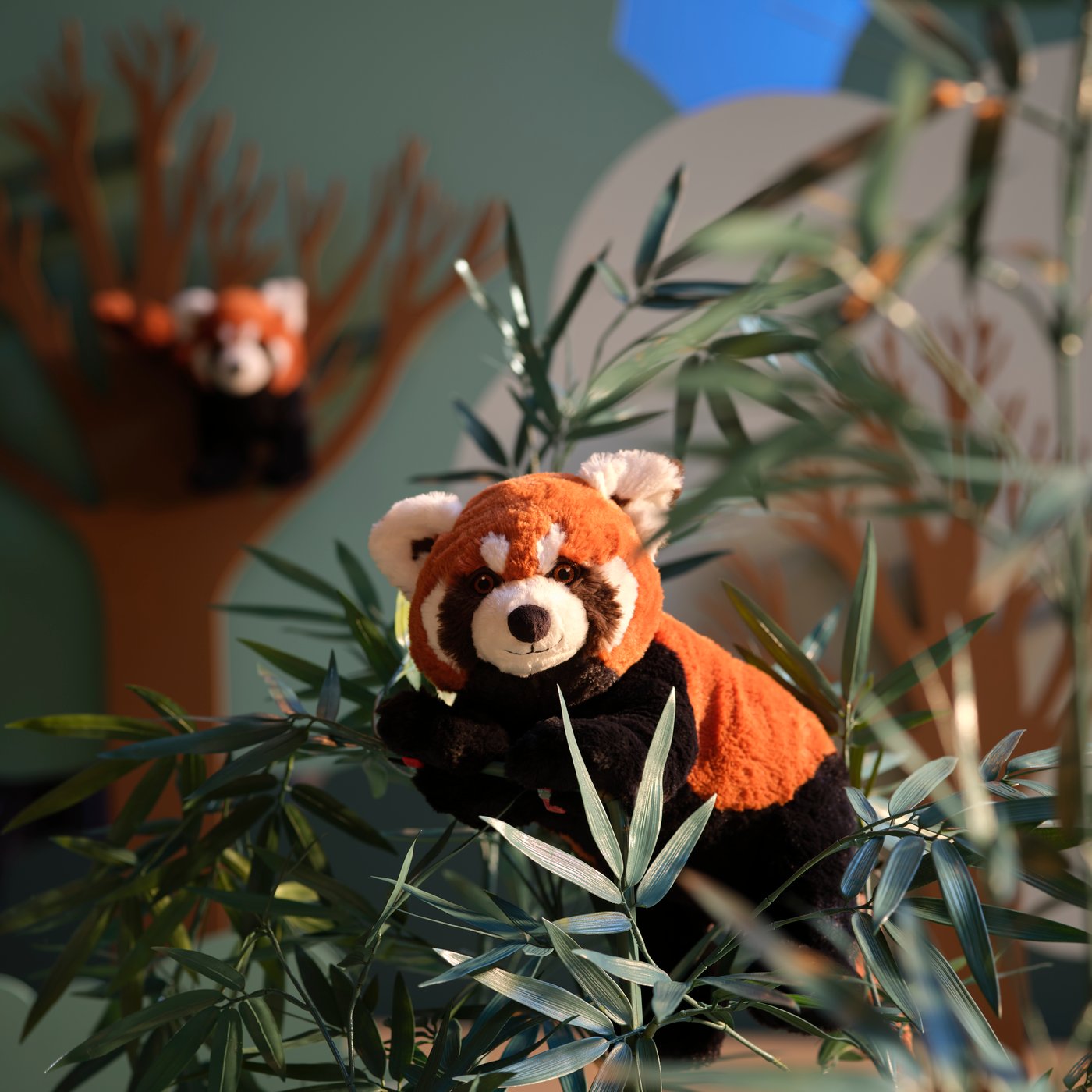 A red panda ALPTALL soft toy