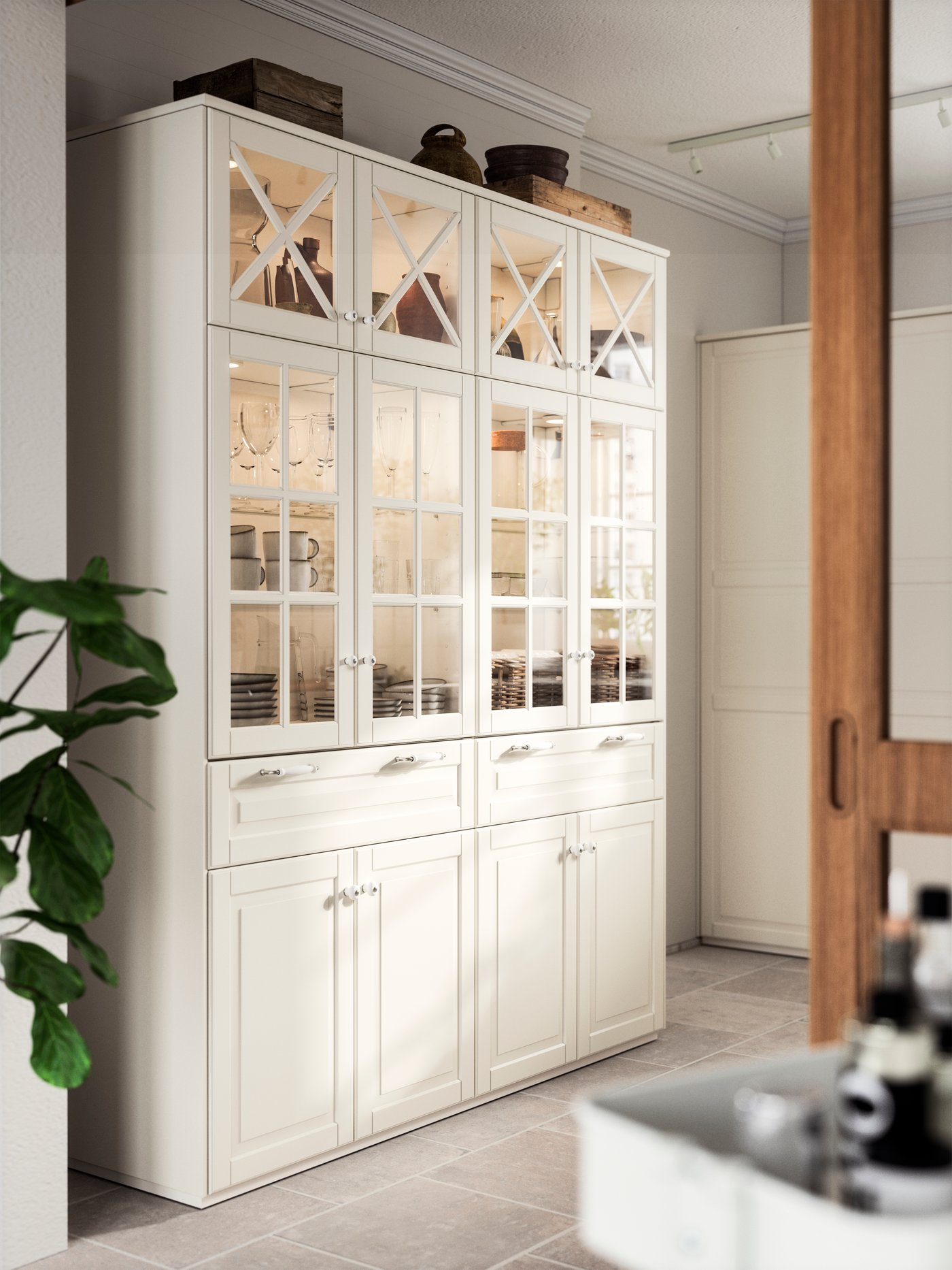 A white HAVSTA storage comb w sliding glass doors