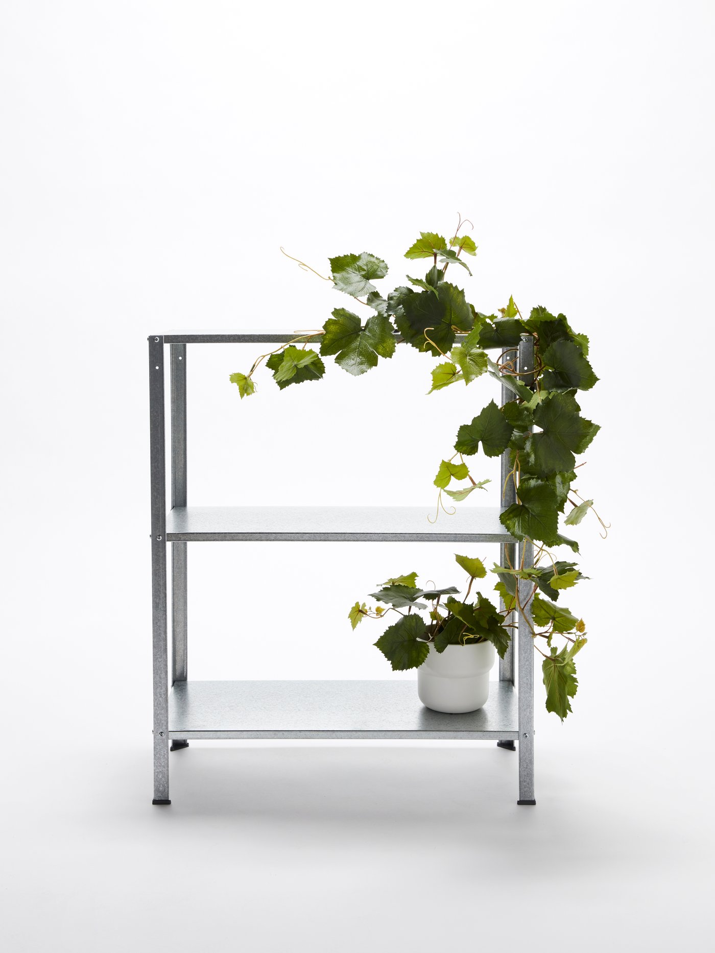 An in/outdoor HYLLIS shelving unit