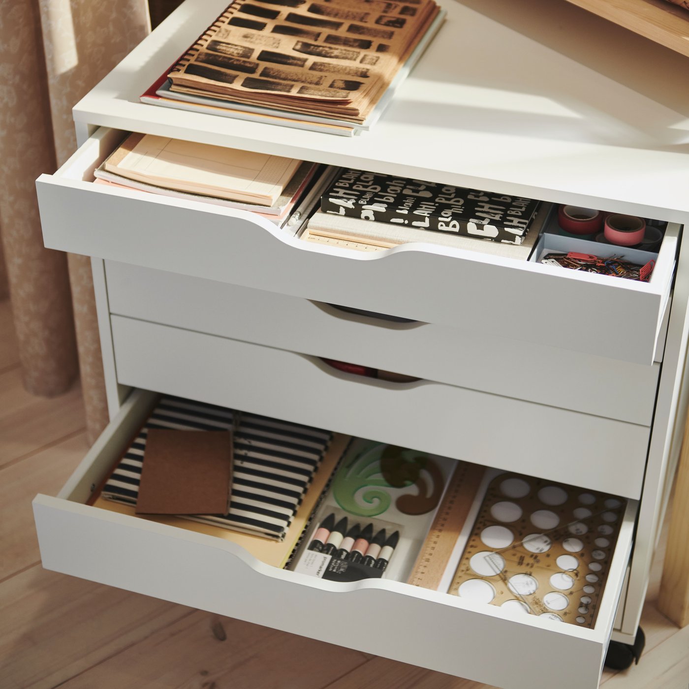 A white ALEX drawer unit on castors, with six drawers.