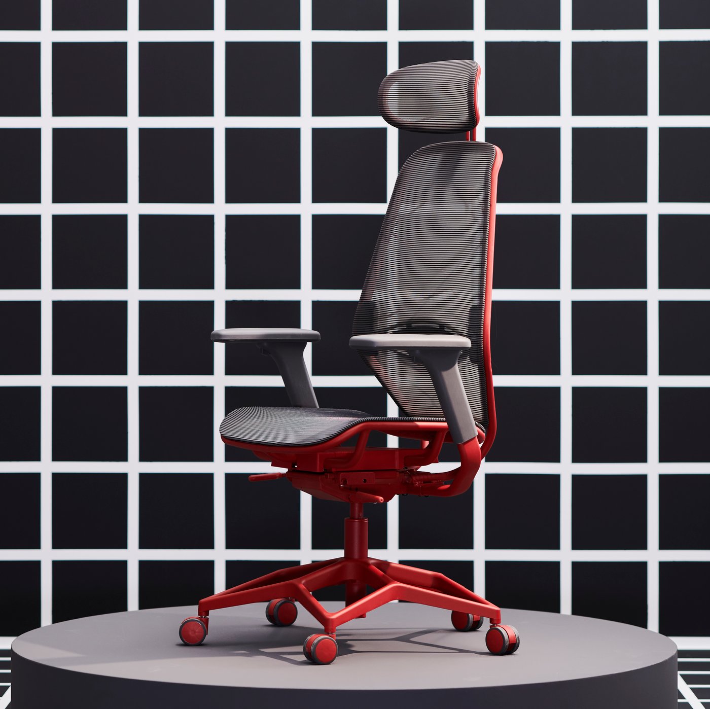 A grey/red STYRSPEL gaming chair