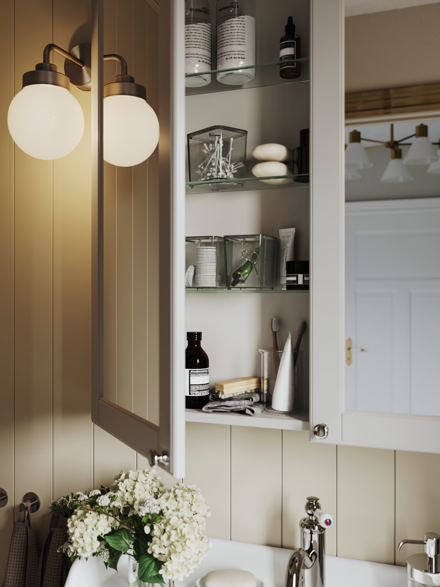 A Kasjön white GODMORGON mirror cabinet with 2 doors in the bathroom