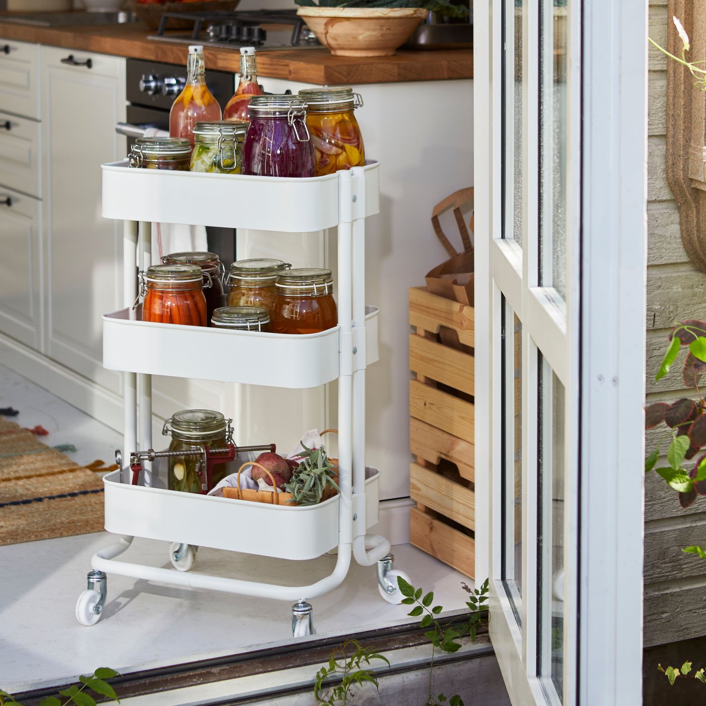 A white RÅSKOG trolley