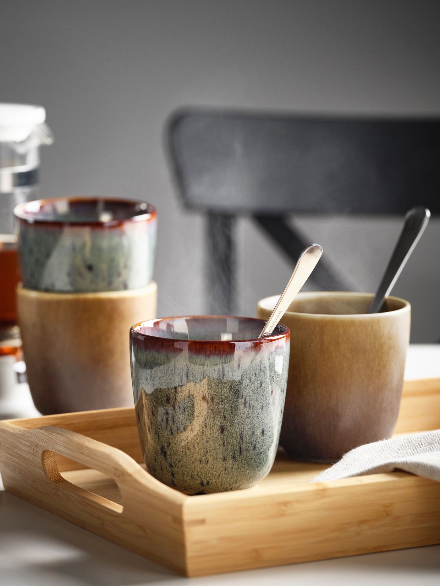 A mixed colours GLADELIG mug