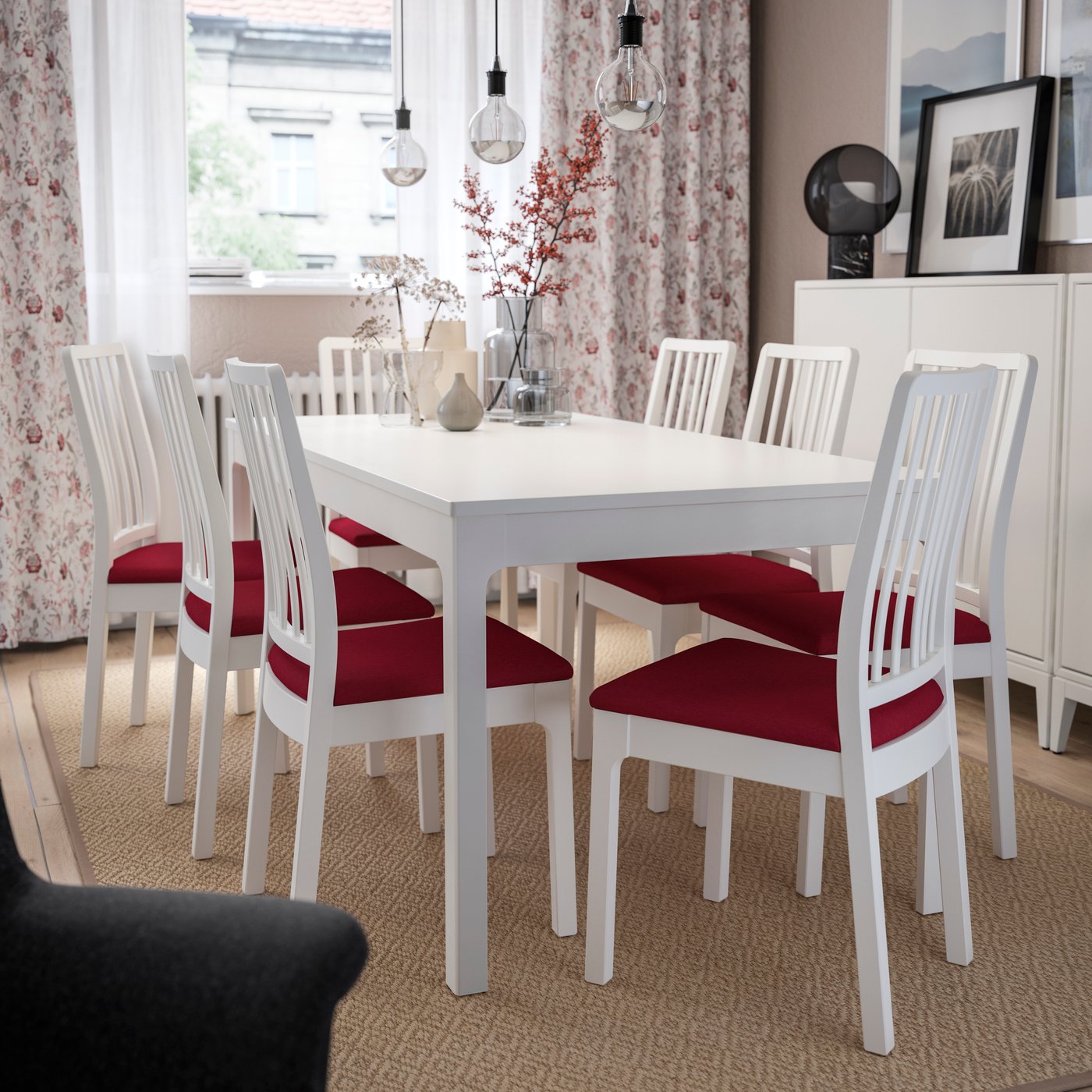 An EKEDALEN chr white/Orrsta red in the dining room