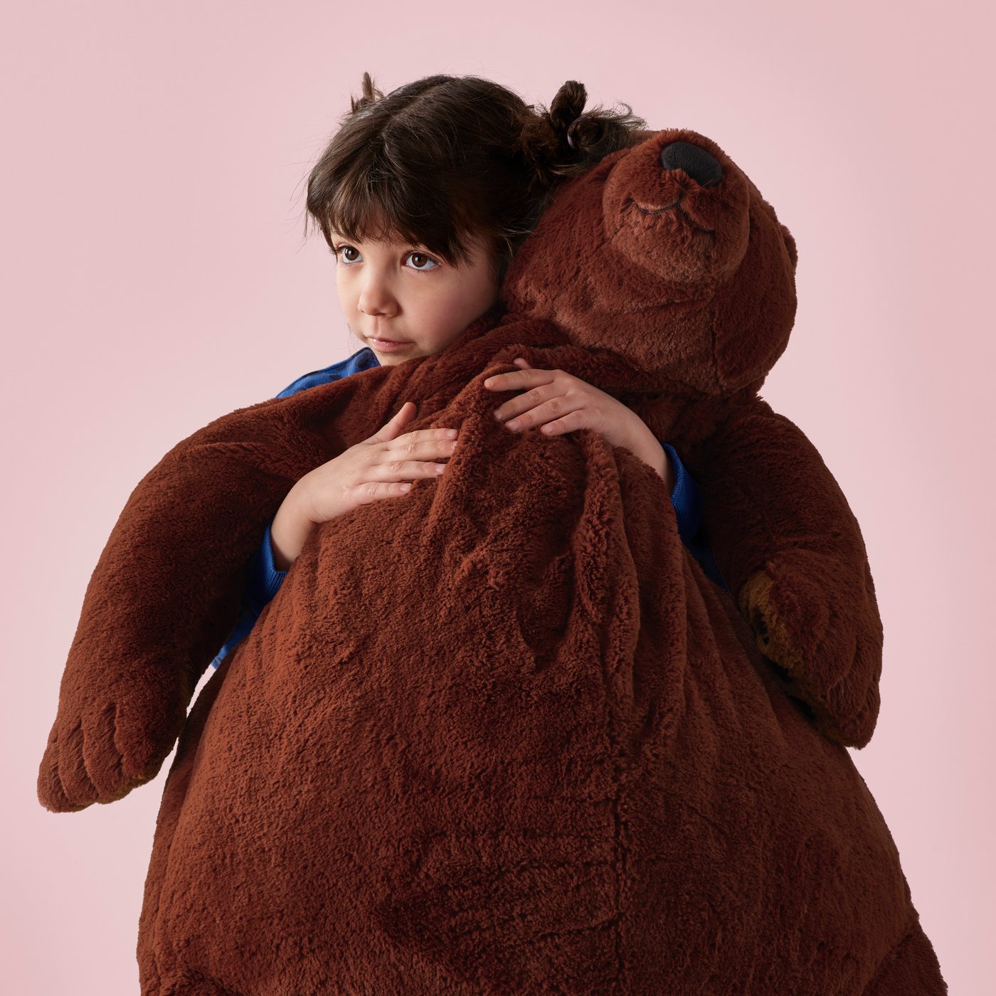 A brown bear DJUNGELSKOG soft toy