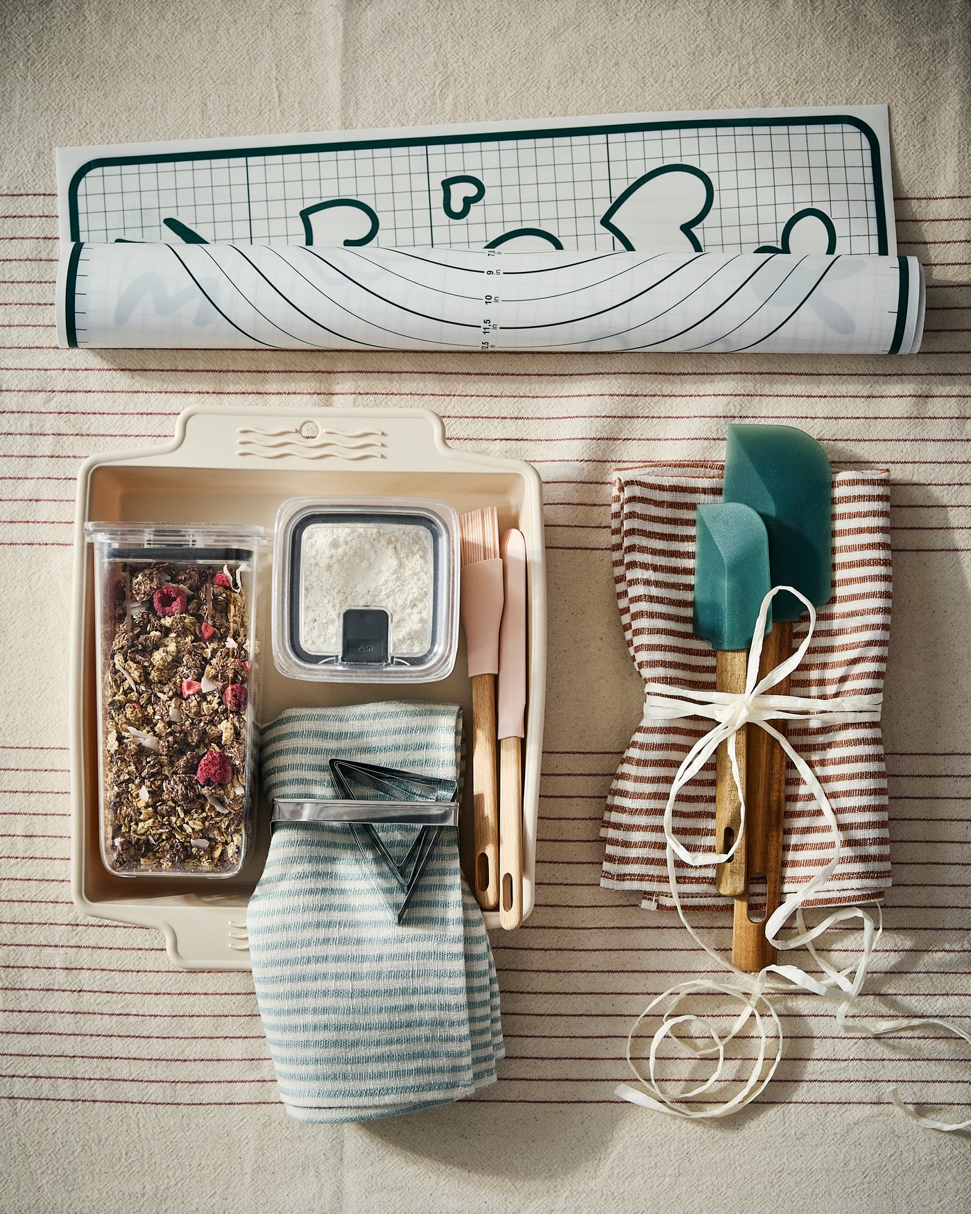 A pale blue/orange striped ÄLVMAL tea towel