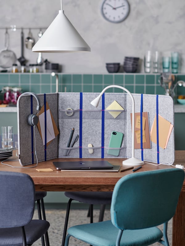 An ÖVNING desk divider with compartments in the home office