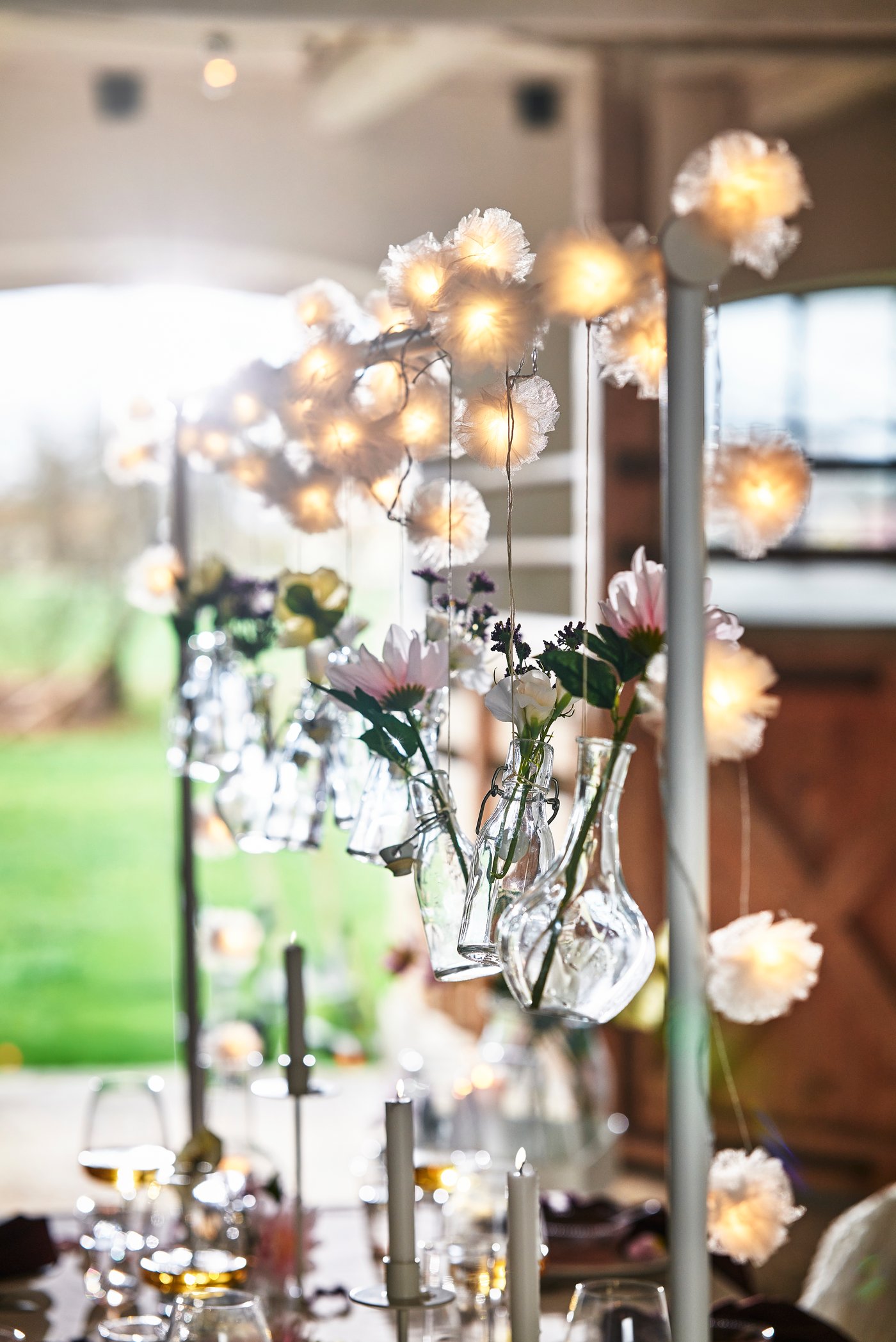 A white adjustable/outdoor indoor  HELGEÖ decorating rod for table