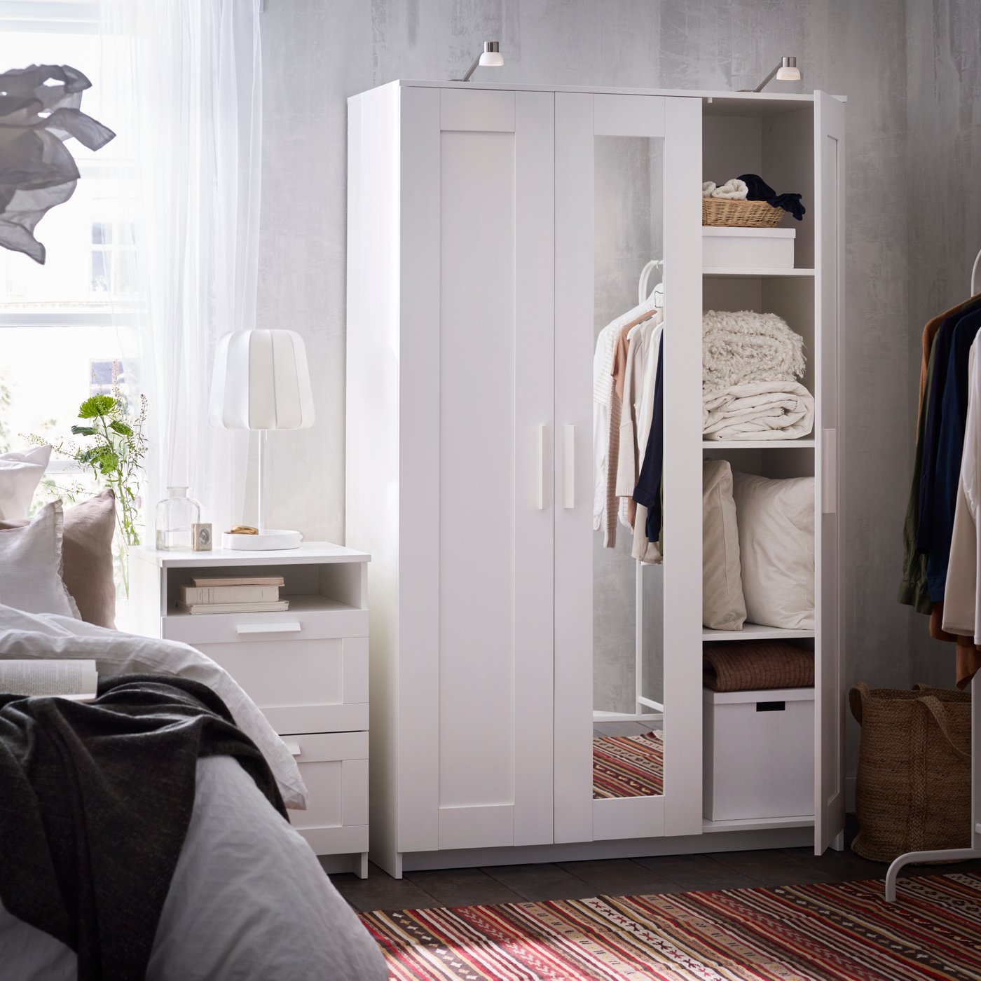 A white BRIMNES wardrobe with 3 doors