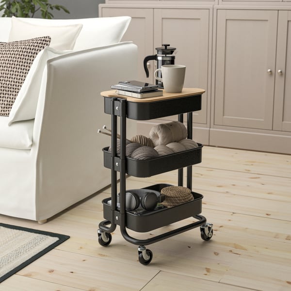 A black RÅSKOG trolley with lid
