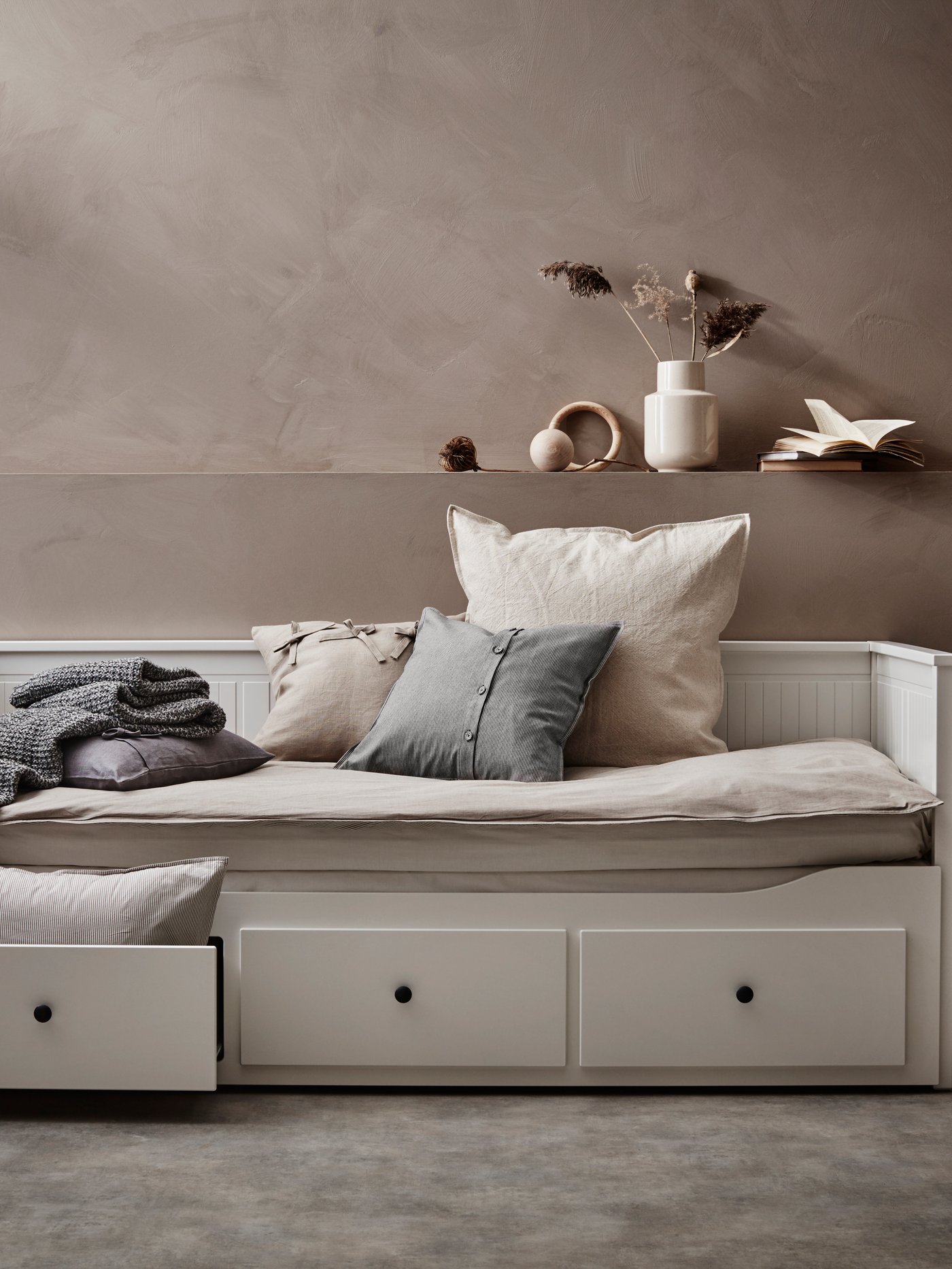 A firm/white MALFORS foam mattress in the bedroom