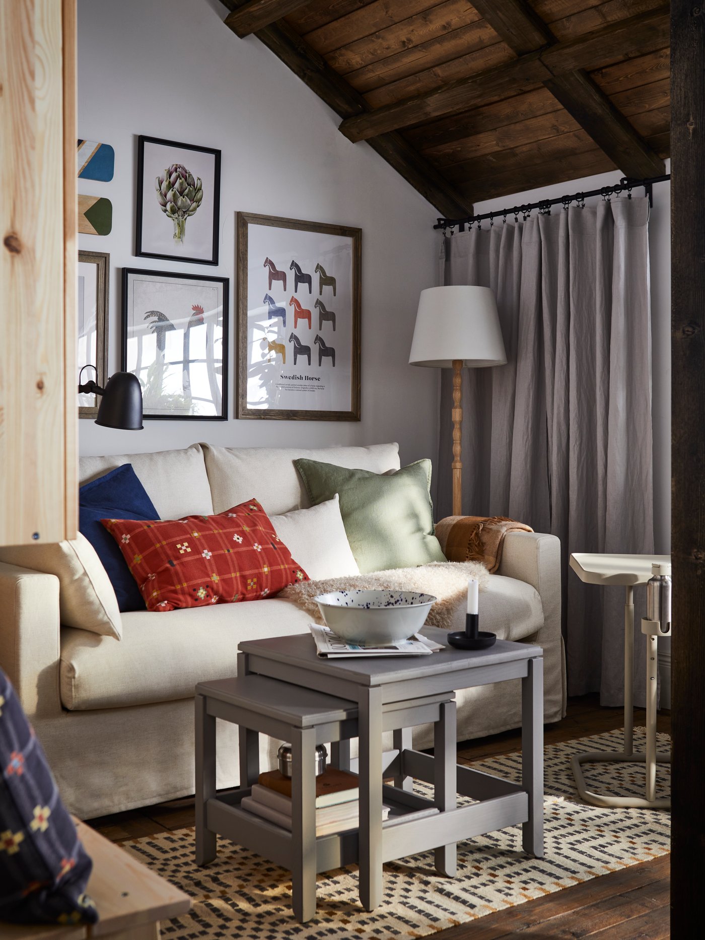 A red KUSTGRAN cushion cover