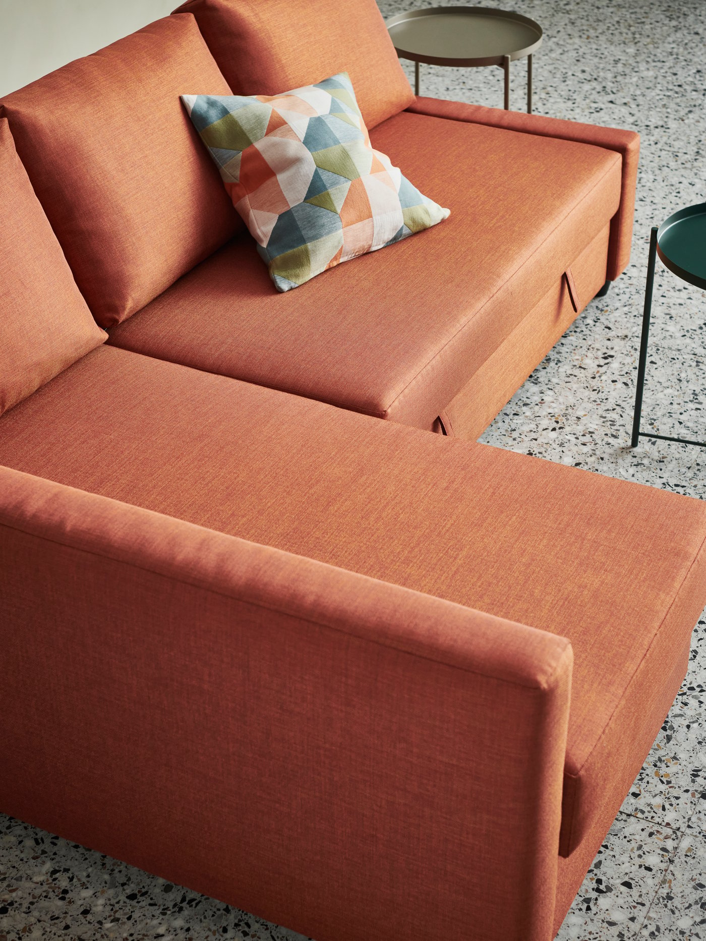 An orange/multicolour SVARTHÖ cushion cover