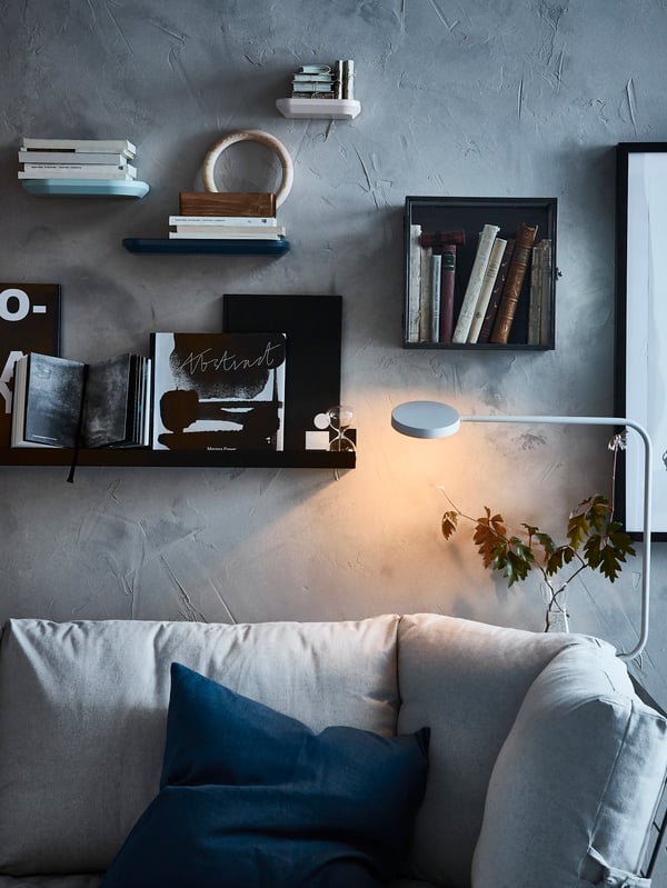 A light grey YPPERLIG LED table lamp in the living room