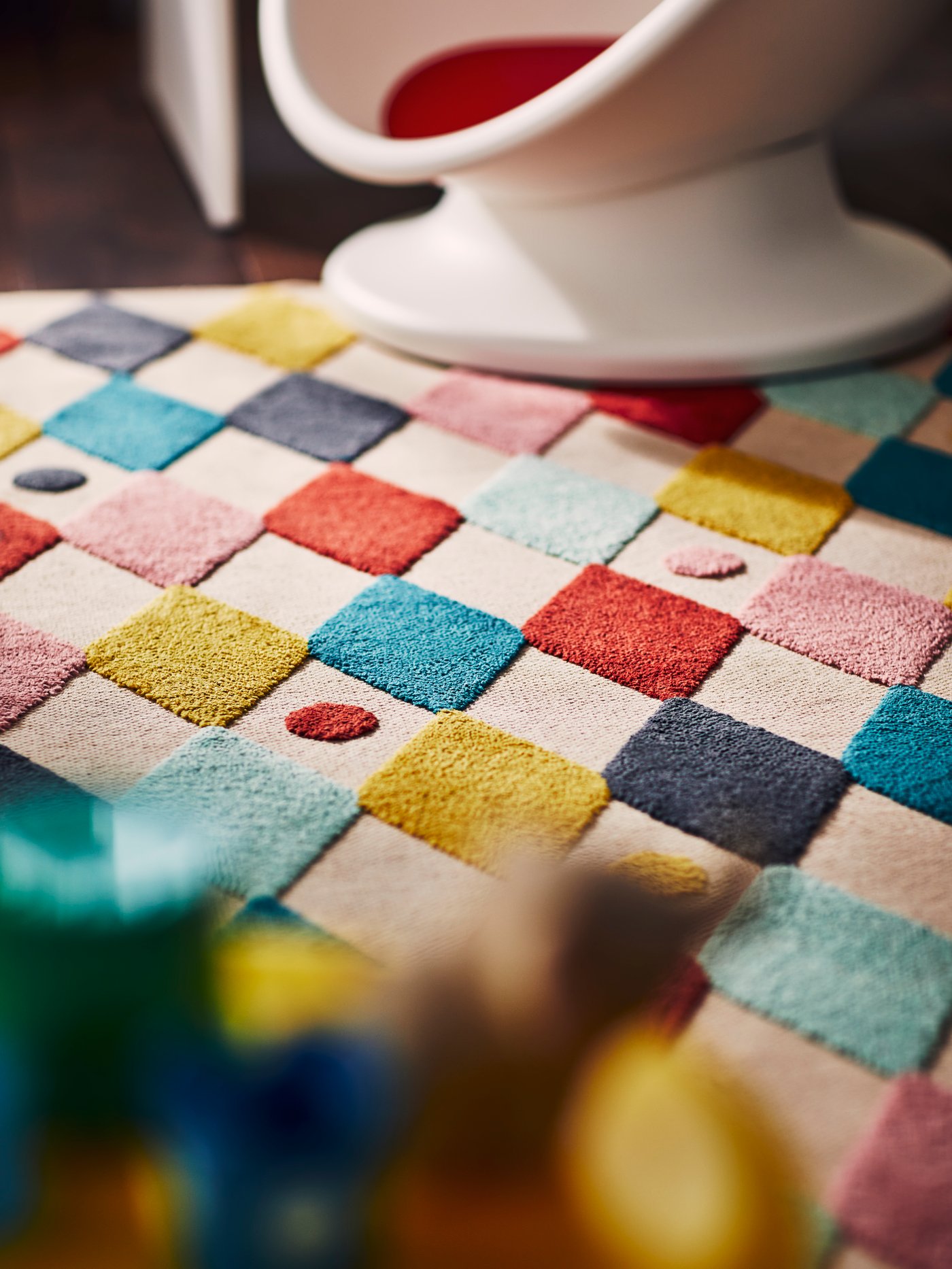A harlequin pattern/multicolour BUSENKEL rug in the NA