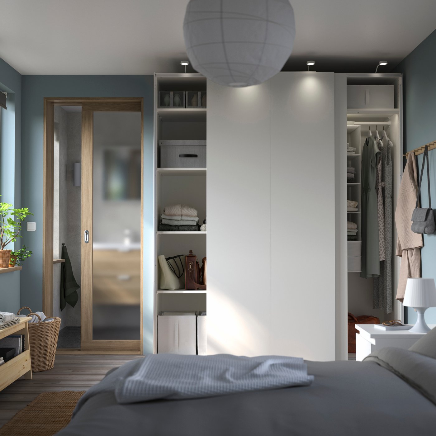 A white/white PAX wardrobe in the bedroom