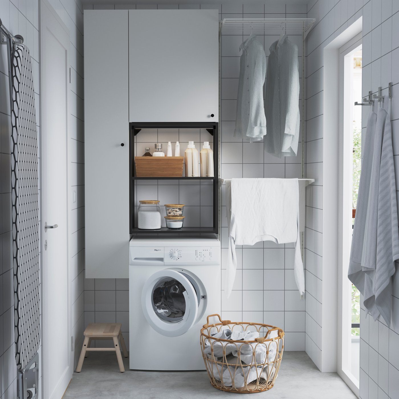 A white BOAXEL drying rack in the laundry room