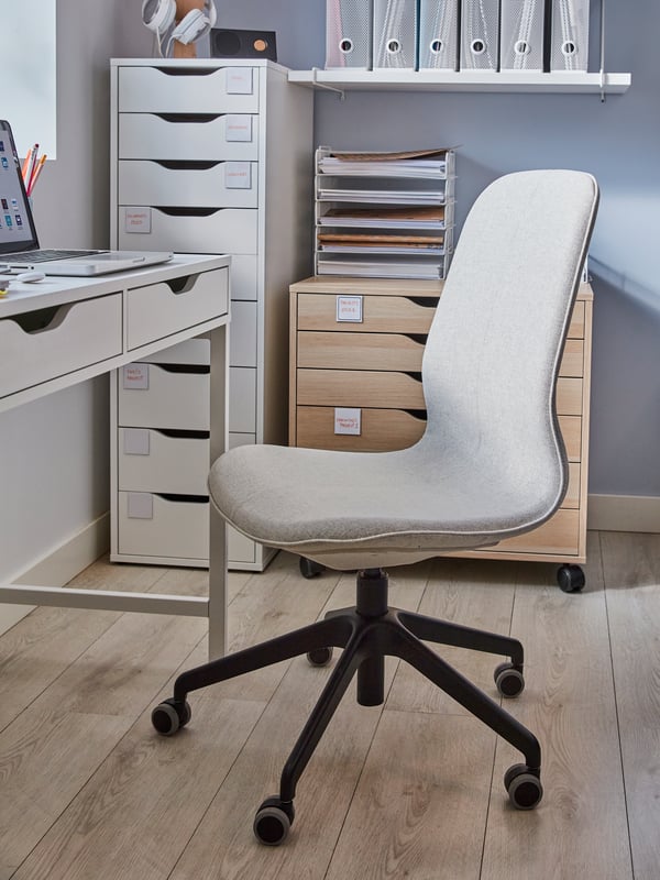 A white DRÖNJÖNS letter tray in the home office