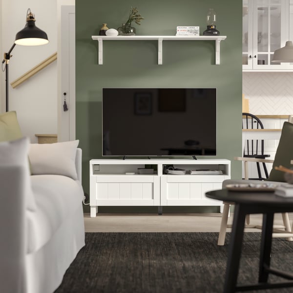 BESTÅ and PIPMAKARE white tv media and storage combination with beadboard design.