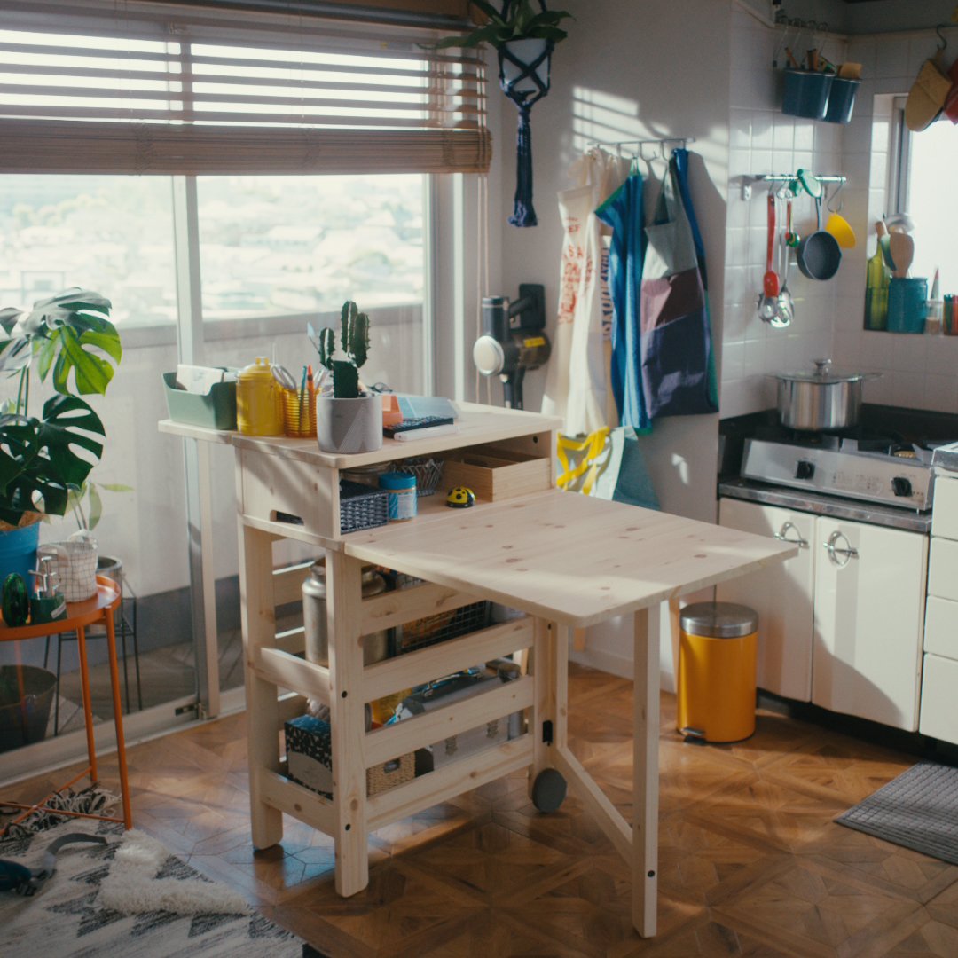 A pine RESARÖ mobile drop-leaf table w storage