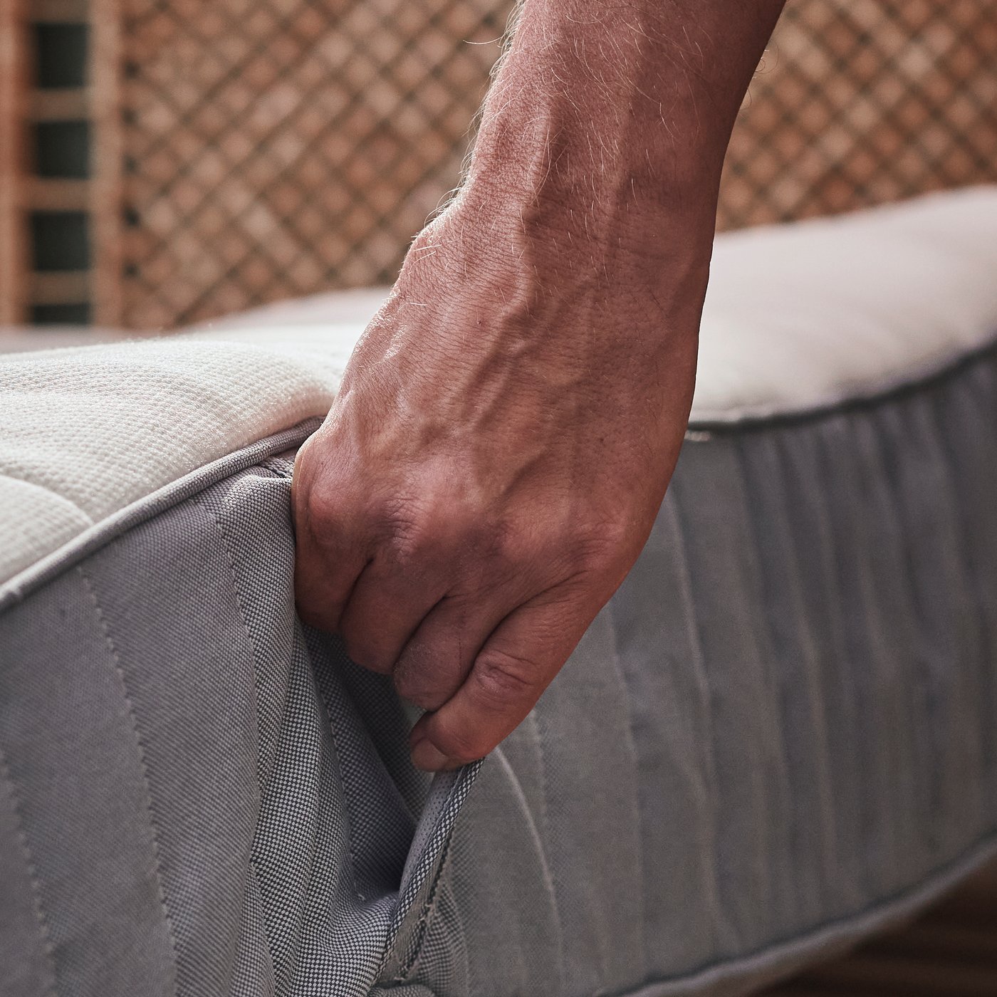 A firm/light blue VALEVÅG pocket sprung mattress