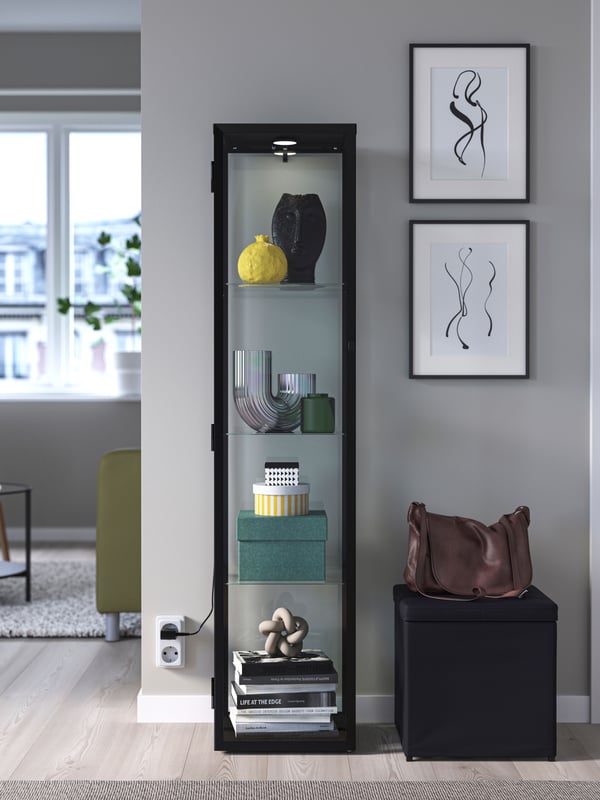 A black BLÅLIDEN glass-door cabinet