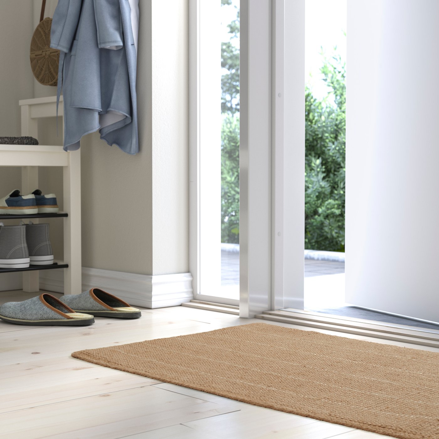 A natural TIOKRONA door mat in the hallway