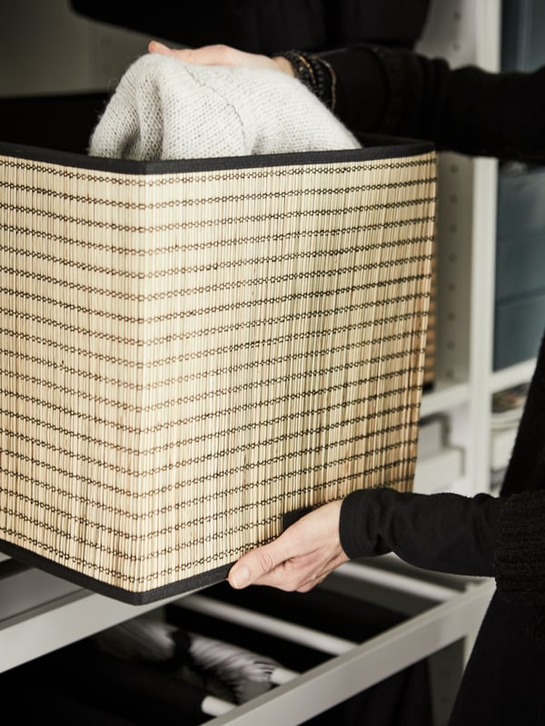 A GNABBAS basket in the bedroom