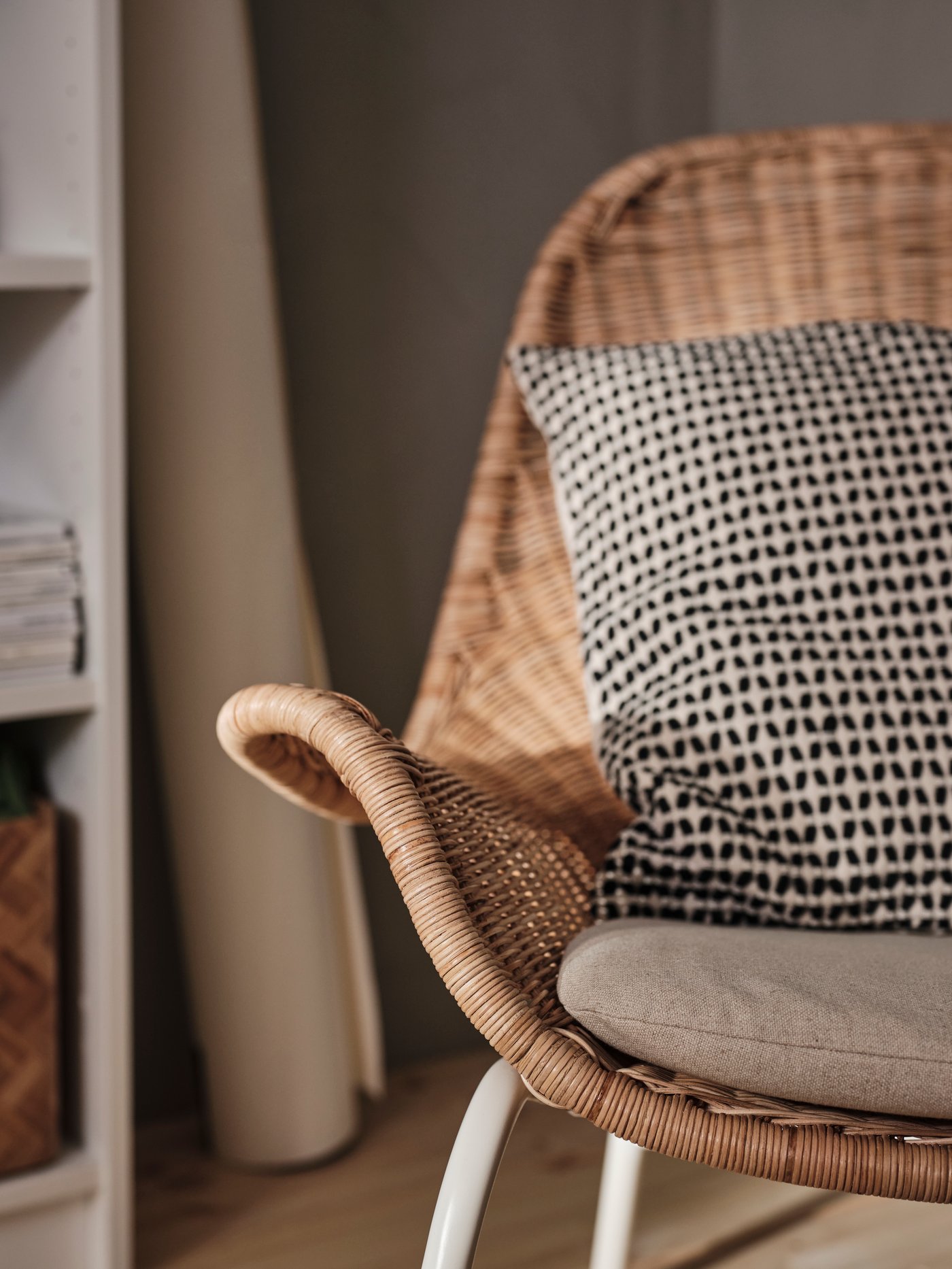 A rattan/Risane natural FRYKSÅS armchair with cushion