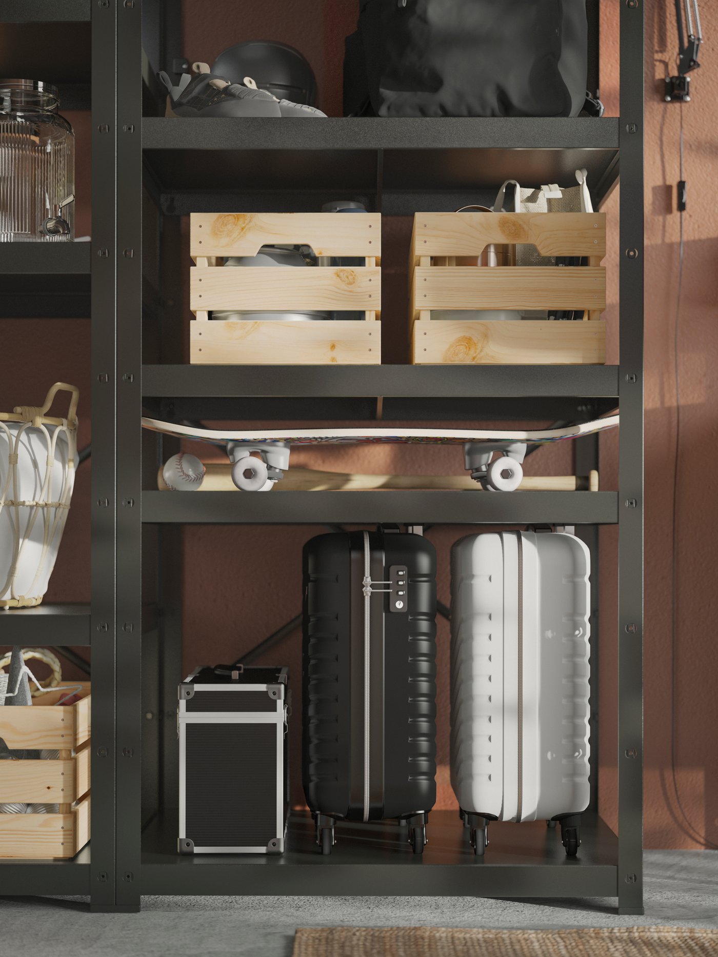 Suitcases, a skateboard and other secondary storage neatly arranged on shelves and in KNAGGLIG boxes in BROR shelving units.