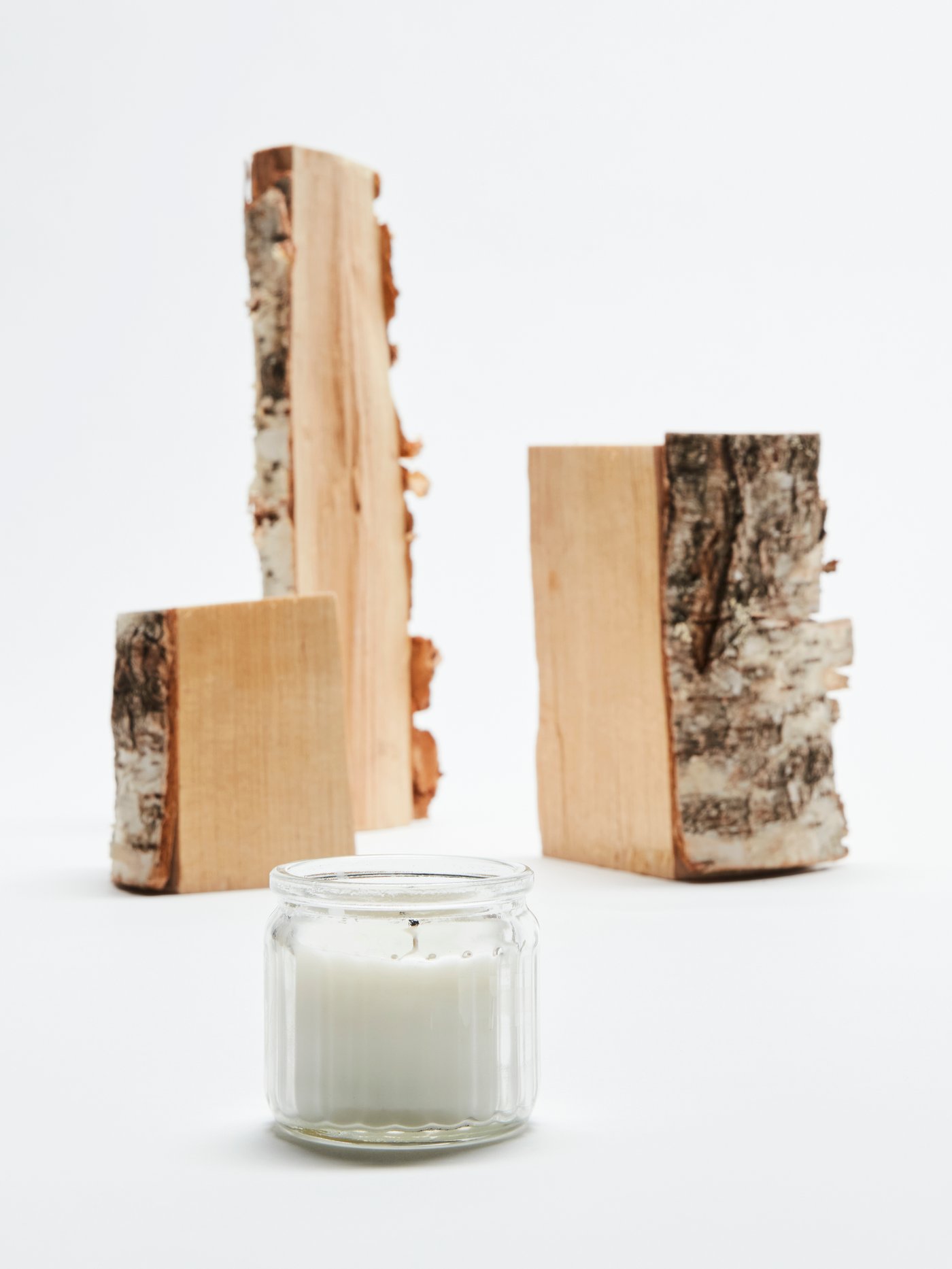 A Scandinavian Woods/white ADLAD scented candle in glass